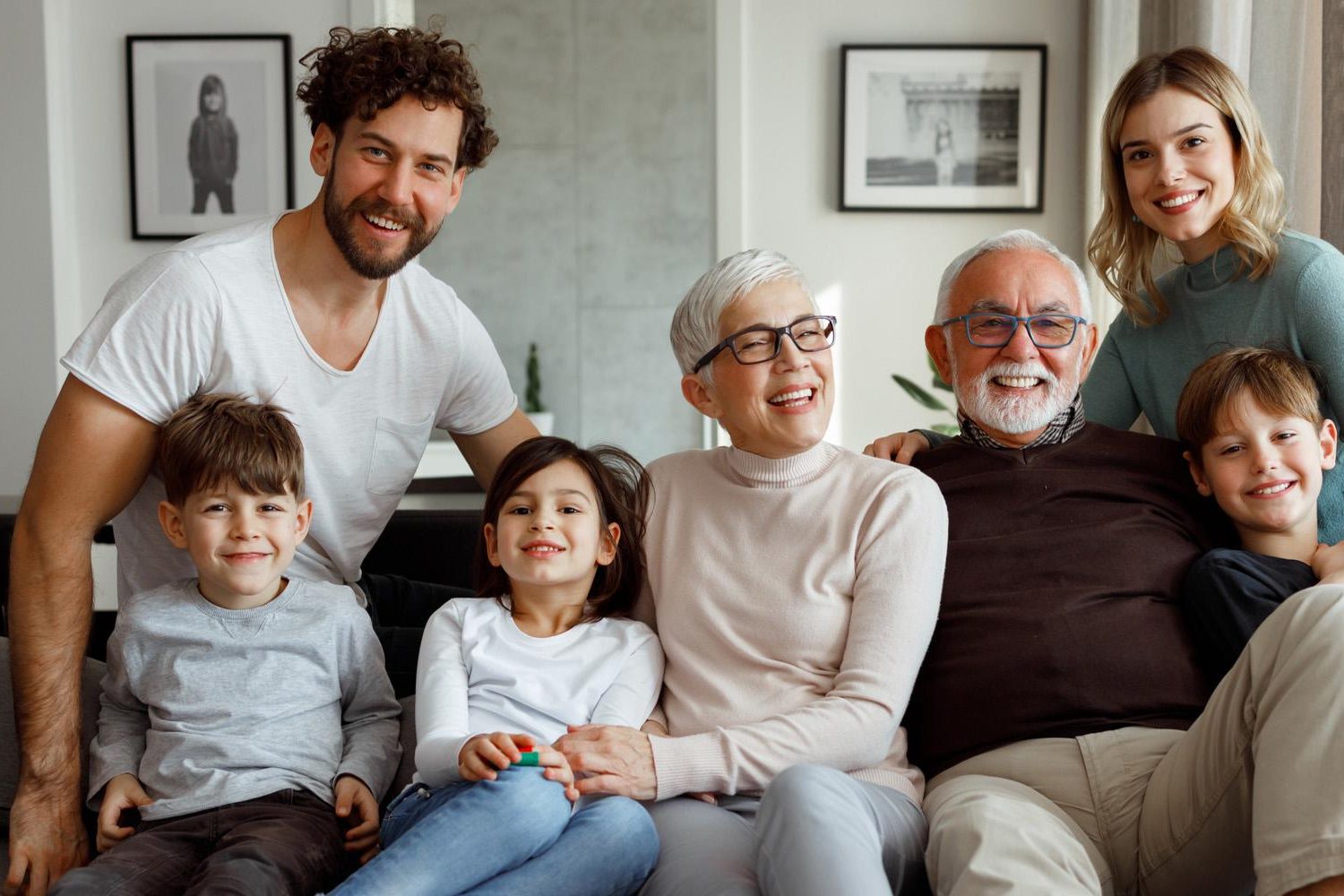 Family on sofa home page #image_title